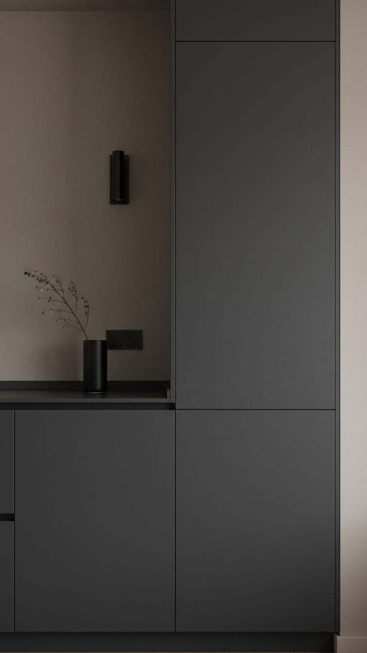 Hidden kitchen appliances behind seamless handleless dark cabinetry, showcasing a minimalist and sleek integrated kitchen design.