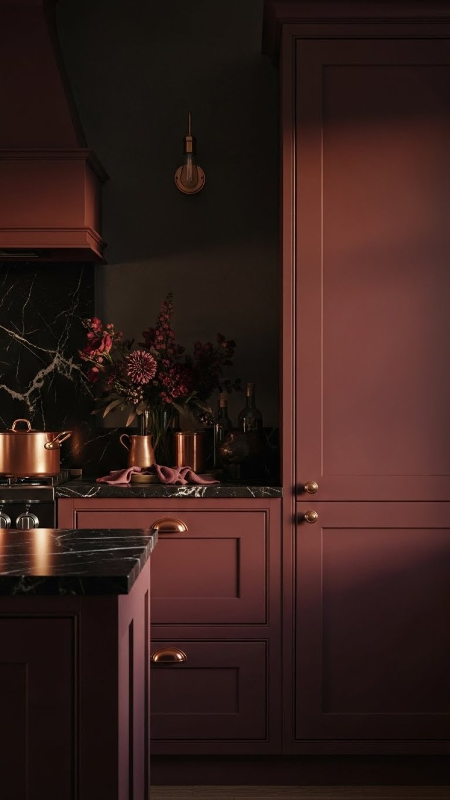 Luxurious burgundy kitchen cabinets with high-end hardware, dark marble countertop, copper cookware. Elegant dark kitchen aesthetic.
